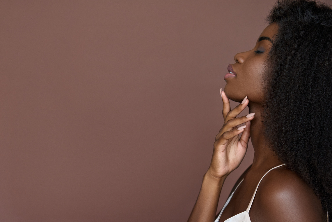 Woman on Brown Background